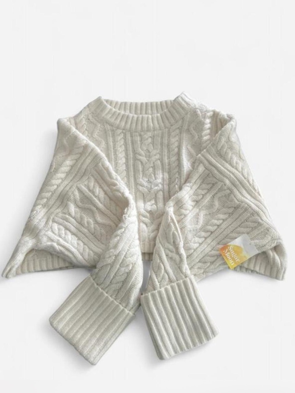 Cropped Cable-Knit Crewneck Sweater in Cream